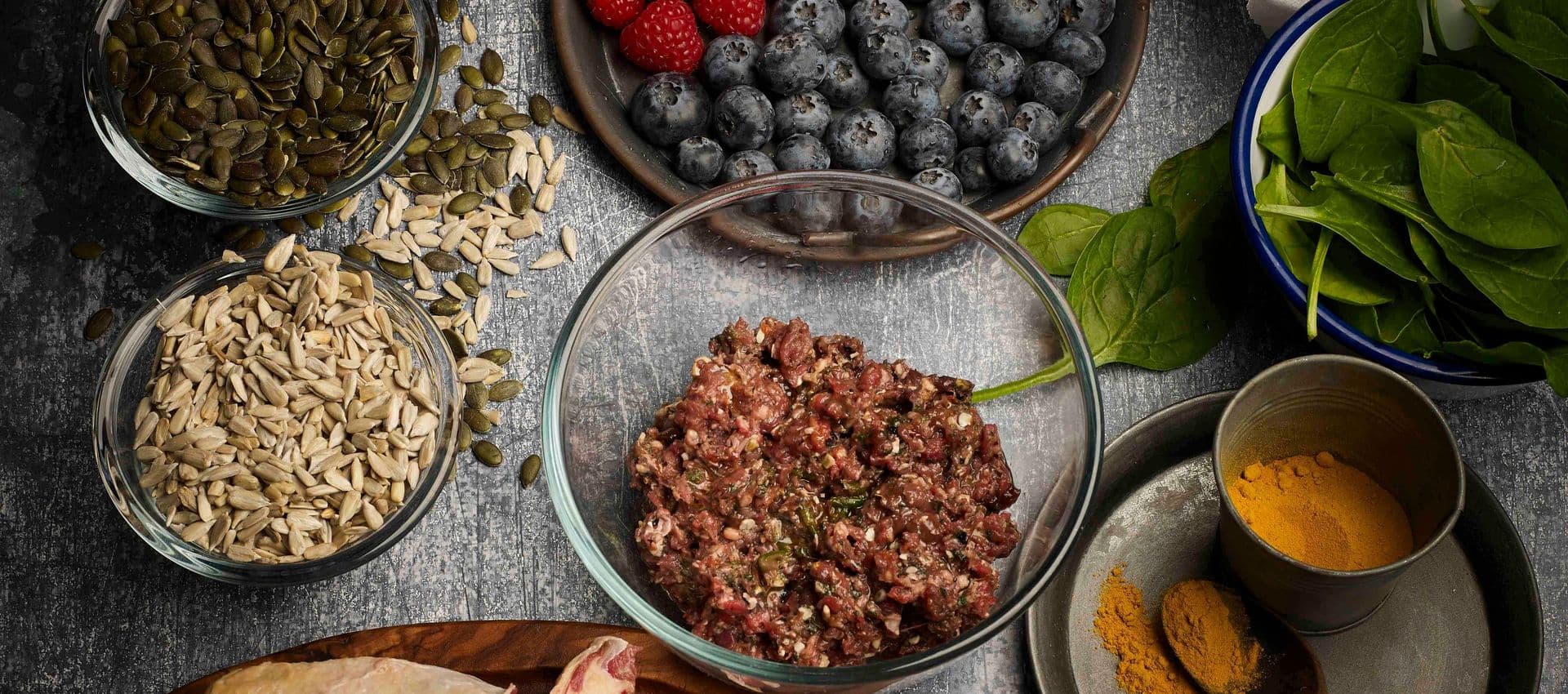 Minced beef and ingredients on a table